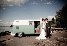 Bride and Groom Next to a Van
